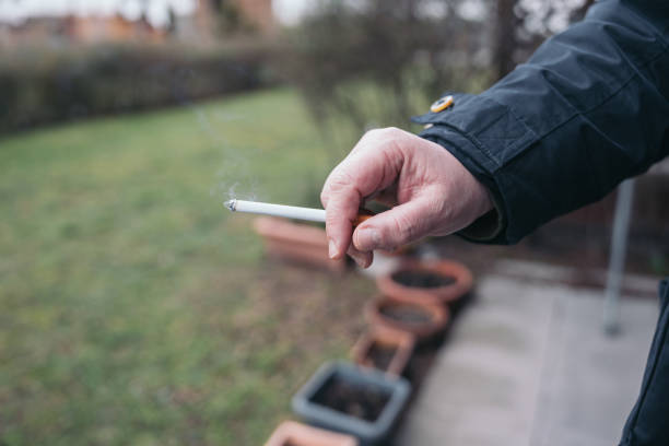 Woman's hand holding a cigarette